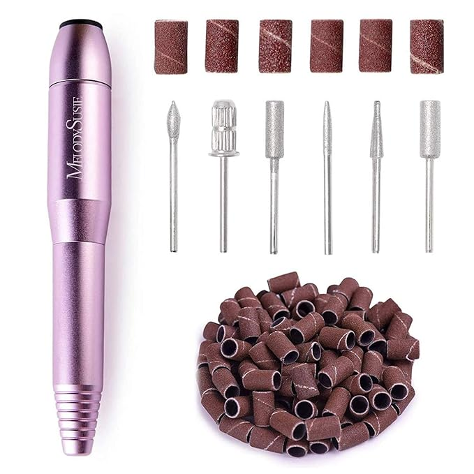 Purple nail drill with attachments and sanding bands