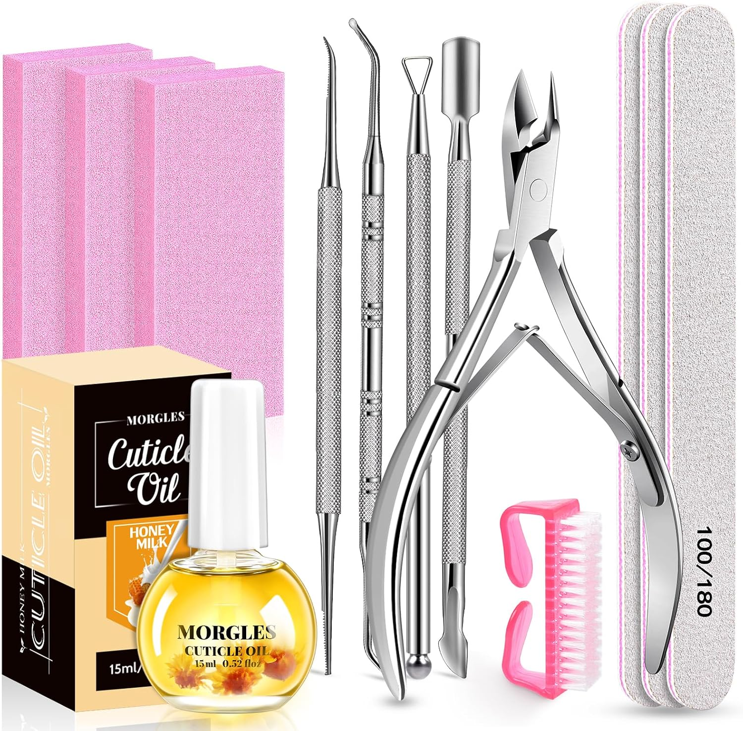 Manicure accessories with pink buffers and cuticle oil